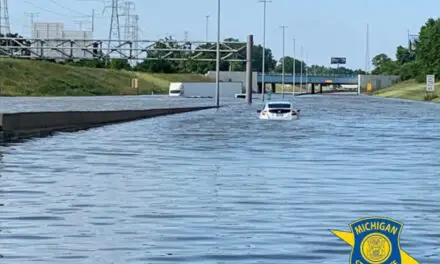 Flood waters left dozens of Semi Trucks stranded on I-94 in Detroit