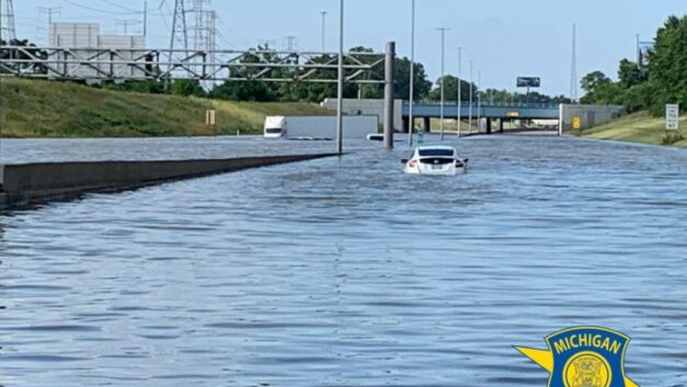 Flood waters left dozens of Semi Trucks stranded on I-94 in Detroit