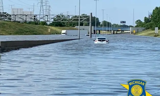 Flood waters left dozens of Semi Trucks stranded on I-94 in Detroit