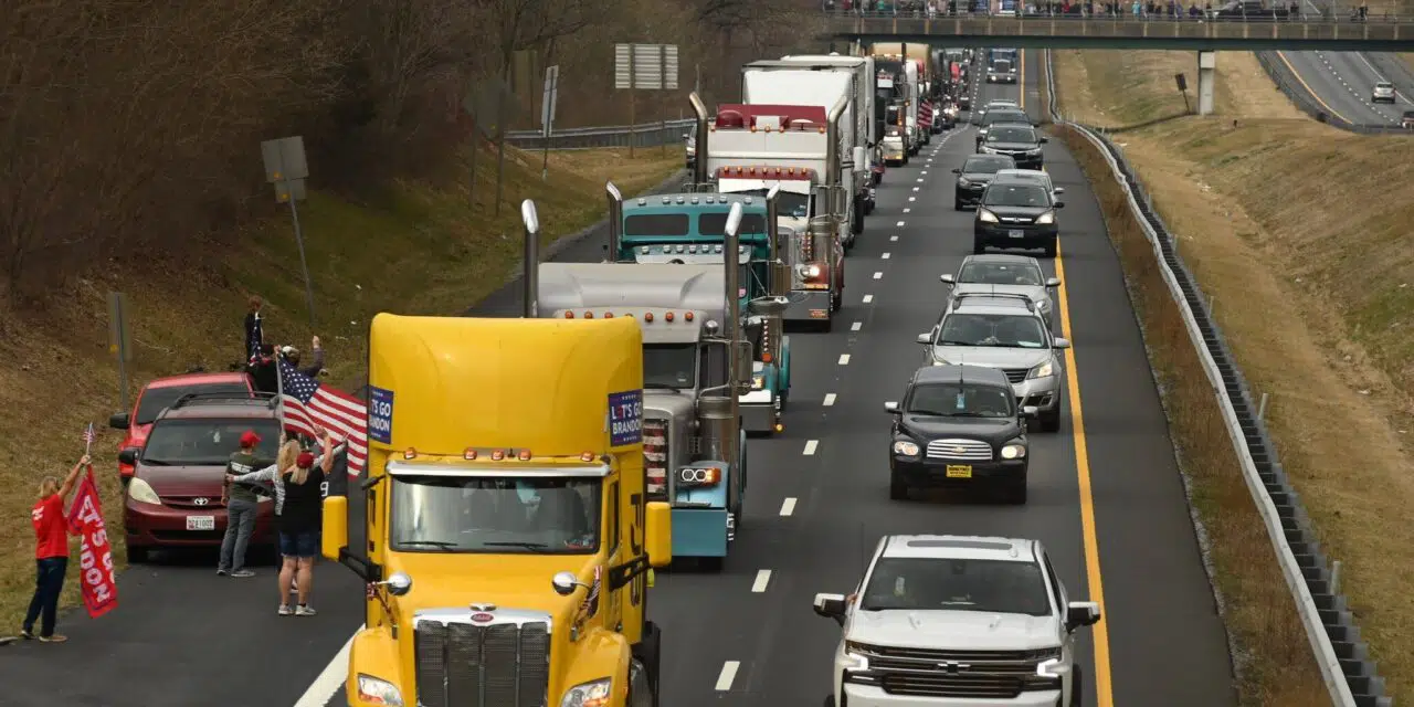 Hundreds of vehicles protesting Covid mandates surround Washington, led by truckers.