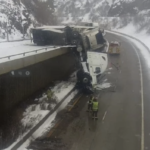 I-70 was closed after a semi-truck was hanging off the road!