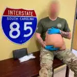 Bizarre Drug Bust: “Zigzagging” Motorist Caught with Cocaine Hidden in Fake Pregnant Belly